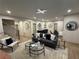 Cozy living space featuring a comfortable sofa, stylish decor, and an open staircase at 253 Rockyford Ne Rd, Atlanta, GA 30317