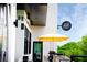 Exterior shot of Perc Coffee shop featuring an outdoor umbrella table and modern decor at 253 Rockyford Ne Rd, Atlanta, GA 30317