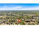 Beautiful home in a desirable neighborhood with lush greenery and mature trees visible from an aerial view on a sunny day at 3477 Seneca Farm Dr, Buford, GA 30519