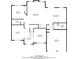 Detailed floor plan outlining the layout of the home's first floor, including the kitchen, living room, and garage at 3477 Seneca Farm Dr, Buford, GA 30519