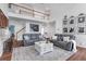 Spacious living room boasting plush seating, hardwood floors, and decorative elements at 3477 Seneca Farm Dr, Buford, GA 30519