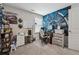 Well-lit home office featuring Star Wars decor and comfortable workspace at 4777 Waxwing St, Hoschton, GA 30548