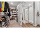 Spacious walk-in closet with custom shelving and a view of the shower room at 4777 Waxwing St, Hoschton, GA 30548