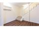 Partially finished basement with stairs, vinyl floors, and white walls at 2227 Leafmore Drive, Decatur, GA 30033