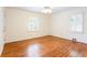 Bedroom with natural light, hardwood floors, and neutral walls at 2227 Leafmore Drive, Decatur, GA 30033