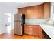 Kitchen with stainless steel appliances, wooden cabinets, and ample counter space at 2227 Leafmore Drive, Decatur, GA 30033