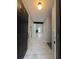 An open entry way featuring light gray walls and marble tile flooring at 3285 Rollingbrook Way, Duluth, GA 30096