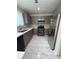 Kitchen with stainless steel appliances and shaker cabinets at 3285 Rollingbrook Way, Duluth, GA 30096