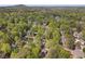 Beautiful aerial view of a property nestled among lush greenery at 4152 Barberry Ne Dr, Roswell, GA 30075