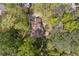 Overhead aerial view of a home surrounded by trees and manicured landscaping at 4152 Barberry Ne Dr, Roswell, GA 30075