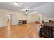 Upstairs bonus room boasts hardwood flooring and multiple entryways, offering flexibility and space at 4152 Barberry Ne Dr, Roswell, GA 30075