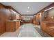 Large craft room with built-in storage cabinets, countertops, shelving, and natural lighting at 4152 Barberry Ne Dr, Roswell, GA 30075