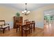 Dining room with hardwood floors and classic trim at 4152 Barberry Ne Dr, Roswell, GA 30075