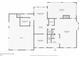 First floor plan featuring a kitchen, living room, and garage layout at 4152 Barberry Ne Dr, Roswell, GA 30075