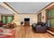 Spacious living room featuring hardwood floors and lots of natural light at 4152 Barberry Ne Dr, Roswell, GA 30075