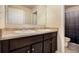 Modern bathroom with double sinks, a large mirror, and ample storage space, designed for convenience and style at 8484 Glenview St, Douglasville, GA 30134