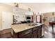 Modern kitchen with stainless steel appliances, granite countertops, and an open view to the living room at 8484 Glenview St, Douglasville, GA 30134