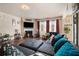 Comfortable living room boasts natural light, a cozy fireplace, sleek TV, and plush seating, perfect for relaxation at 8484 Glenview St, Douglasville, GA 30134