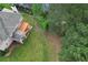 Aerial view of backyard with a deck and view of the trees at 1035 Eagles Brooke Dr, Locust Grove, GA 30248