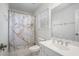 Bathroom with combination shower and tub with marble-design curtain and sink with chrome faucet at 1035 Eagles Brooke Dr, Locust Grove, GA 30248