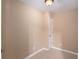 Cozy bedroom with neutral paint and carpet and white trim, featuring a standard closet at 1035 Eagles Brooke Dr, Locust Grove, GA 30248
