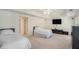 Large bedroom with carpeting can be purposed as a second main bedroom at 1035 Eagles Brooke Dr, Locust Grove, GA 30248