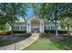 Inviting community pool area with a charming building and well-manicured landscaping at 1035 Eagles Brooke Dr, Locust Grove, GA 30248