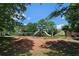 Community playground featuring slides, swings, and climbing structures for children at 1035 Eagles Brooke Dr, Locust Grove, GA 30248
