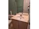 Bathroom featuring a laminate countertop, a single sink, and a toilet at 3102 Aberdeen Cv, Lithonia, GA 30038