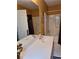 Bathroom featuring double vanity, a framed mirror, and a bathtub at 3102 Aberdeen Cv, Lithonia, GA 30038