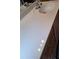Close up of bathroom vanity with a white countertop and silver faucet at 3102 Aberdeen Cv, Lithonia, GA 30038