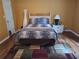 Comfortable bedroom with a stylish bed and modern decor at 3102 Aberdeen Cv, Lithonia, GA 30038
