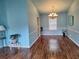 Spacious dining area featuring a chandelier and natural light at 3102 Aberdeen Cv, Lithonia, GA 30038