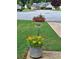 Beautiful front yard with colorful flowers and green grass at 3102 Aberdeen Cv, Lithonia, GA 30038