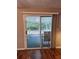 View through sliding glass doors to a screened-in patio at 3102 Aberdeen Cv, Lithonia, GA 30038