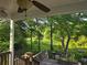 Relaxing back porch overlooking a lush green landscape, perfect for enjoying nature at 345 Oak Springs Nw Dr, Lawrenceville, GA 30043