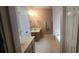 Bathroom with dual sinks, vanity, tub, and separate shower at 345 Oak Springs Nw Dr, Lawrenceville, GA 30043