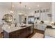 Stylish kitchen showcases a large island with bar seating, stone countertops, and modern stainless steel appliances at 50 Canton St # 406, Alpharetta, GA 30009