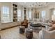 Stylish living room with built-in shelving, comfortable seating, and an elegant area rug at 50 Canton St # 406, Alpharetta, GA 30009