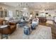 Open-concept living room and dining area, showcasing stylish decor and hardwood floors at 50 Canton St # 406, Alpharetta, GA 30009