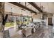 Entertainers outdoor kitchen featuring grilling area, kitchen island, tv, comfortable seating, and large outdoor space at 50 Canton St # 406, Alpharetta, GA 30009