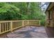 Wooden deck with rug and backyard view at 842 Laurel Crest Sw Ct, Marietta, GA 30064