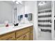 Bathroom with white vanity and shower at 842 Laurel Crest Sw Ct, Marietta, GA 30064