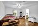Bedroom with wood floors and ensuite bathroom at 842 Laurel Crest Sw Ct, Marietta, GA 30064