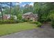 Traditional-style home with a well-manicured lawn and ample green space at 842 Laurel Crest Sw Ct, Marietta, GA 30064