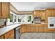 Charming kitchen area with tile floors, light counters, and a garden view at 842 Laurel Crest Sw Ct, Marietta, GA 30064