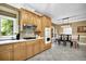 Open concept kitchen, dining room combo features modern fixtures and tile floors at 842 Laurel Crest Sw Ct, Marietta, GA 30064