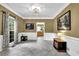 Inviting living room featuring tile floors, large windows, and decorative trim at 842 Laurel Crest Sw Ct, Marietta, GA 30064