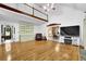 Open-concept living room with hardwood floors and a vaulted ceiling at 842 Laurel Crest Sw Ct, Marietta, GA 30064