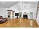 Spacious living room with gleaming hardwood floors and a cozy fireplace at 842 Laurel Crest Sw Ct, Marietta, GA 30064